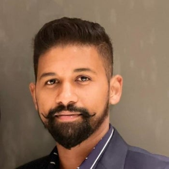 Portrait of Kamil Vyas, Associate.